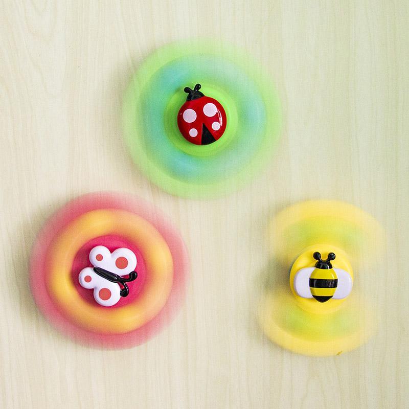 BabySpinner - Buntes Twist-Spielzeug im Saugnapf