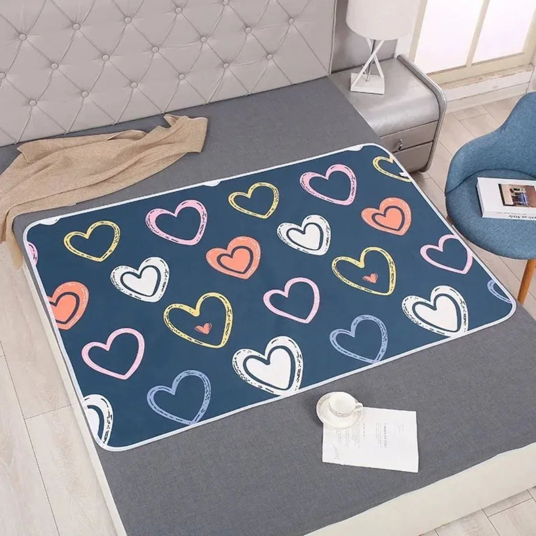 SnugglyNest™ – Wasserdichte Wickelunterlage für Kinder ab 0+ – Hält das Bett Trocken