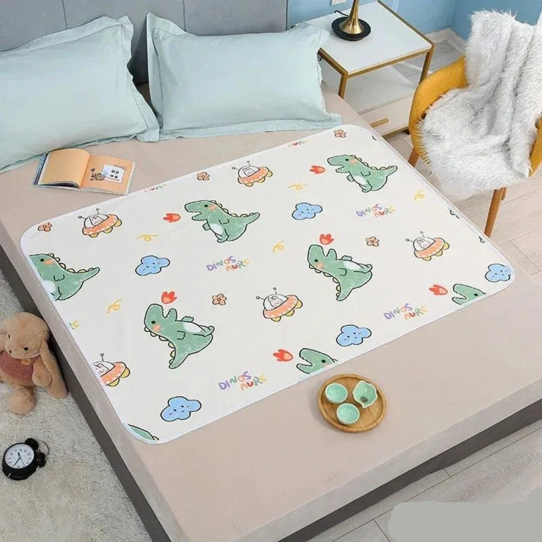 SnugglyNest™ – Wasserdichte Wickelunterlage für Kinder ab 0+ – Hält das Bett Trocken