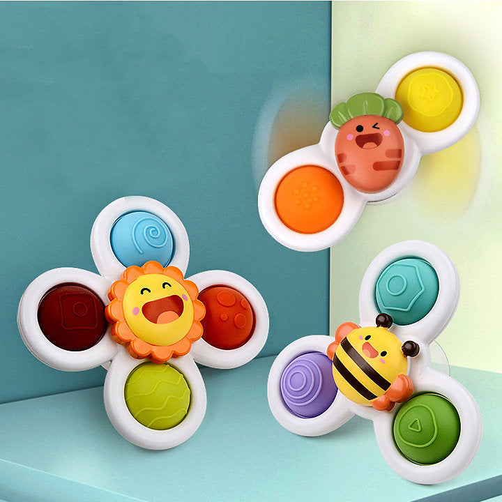 BabySpinner - Buntes Twist-Spielzeug im Saugnapf